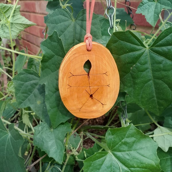 Scots Pine bug pendant.