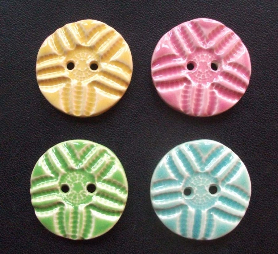 Set of four large ceramic buttons