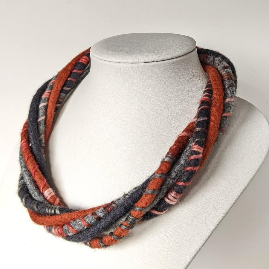 The Wrapped Twist: felted cord necklace in shades of rusty orange and greys