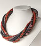 The Wrapped Twist: felted cord necklace in shades of rusty orange and greys