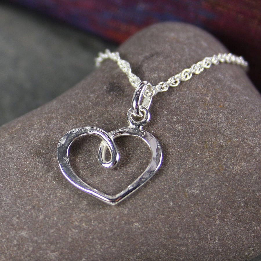 Silver heart pendant on silver chain