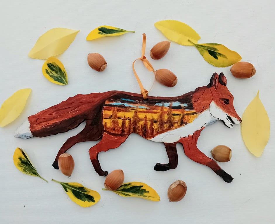 The Autumn Fox on wood with autumnal trees