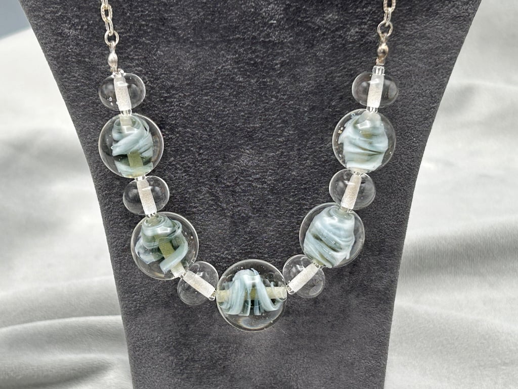 Pale grey and white swirled marble shaped lampwork glass beaded necklace