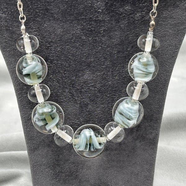 Pale grey and white swirled marble shaped lampwork glass beaded necklace