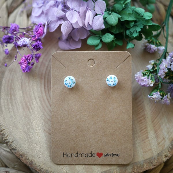 White resin, real flowers, and silver gem stud earrings with sterling silver