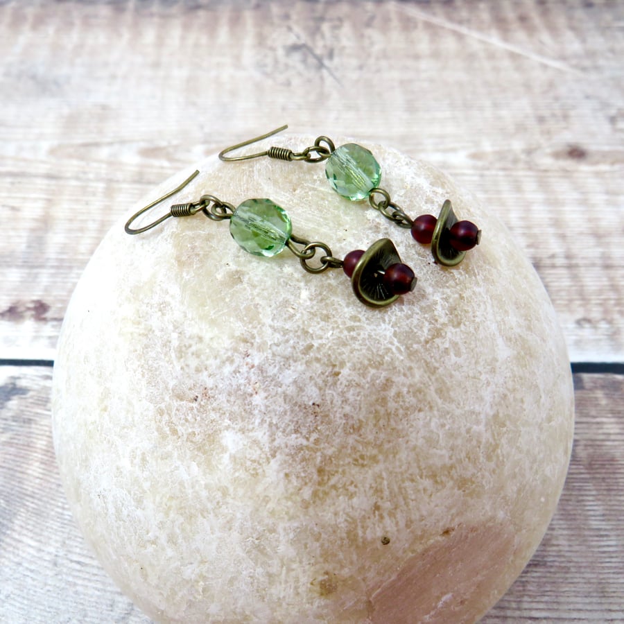 Green and red dangle earrings