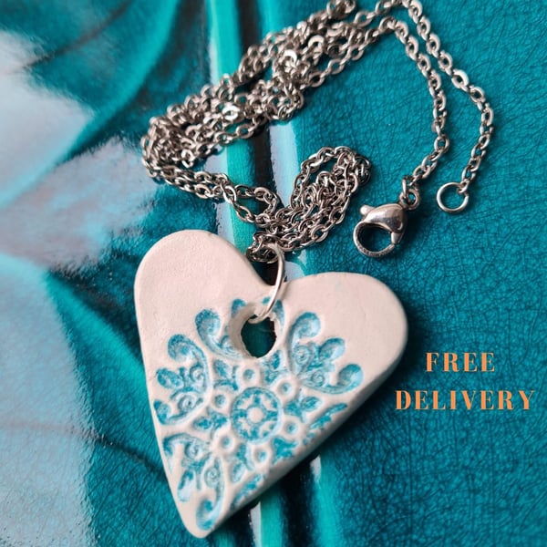 Necklace with air dry clay heart pendant blue embossed