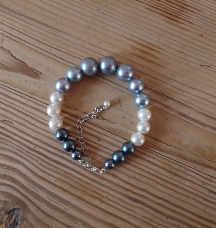 Handmade bracelet made using pre-loved beads.