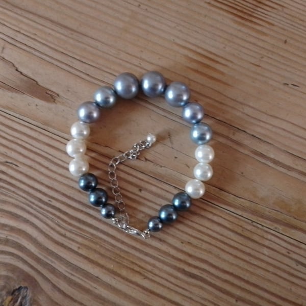 Handmade bracelet made using pre-loved beads.