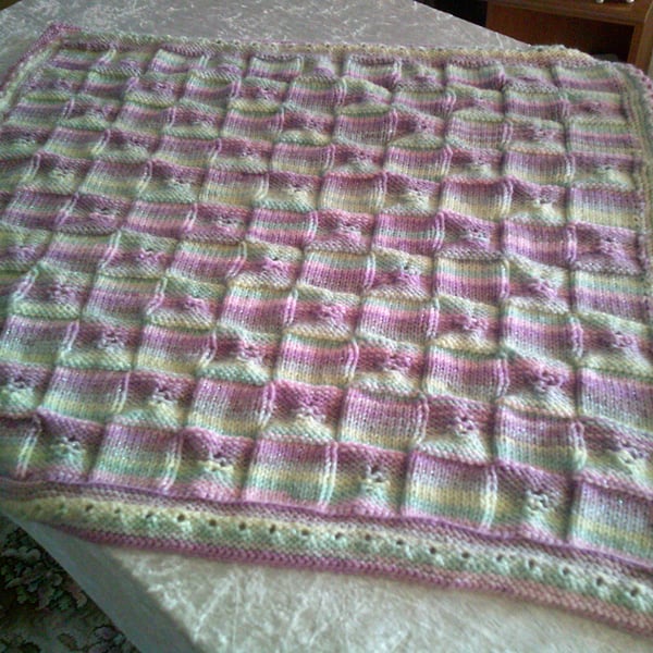 Hand Knitted Pram Blanket with Squares and a Flower Design