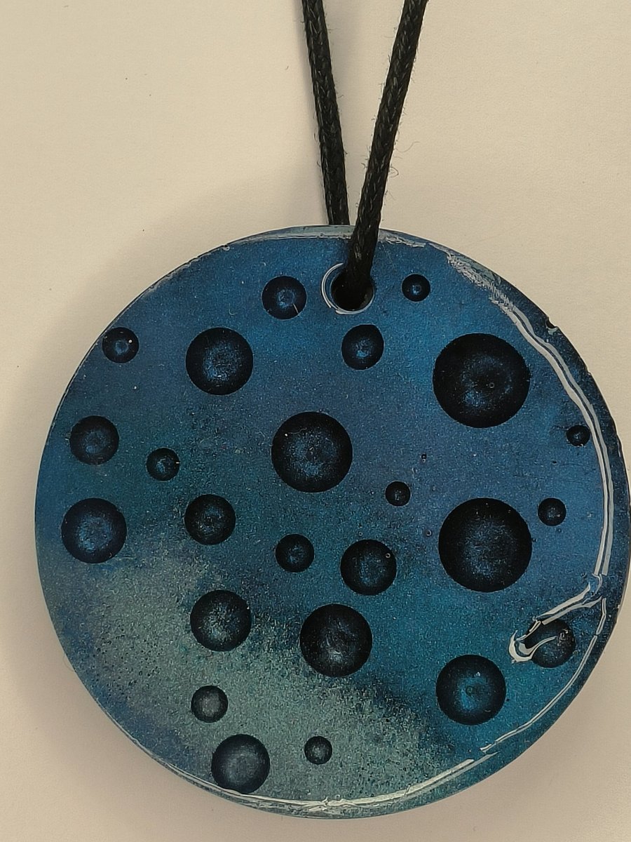 Blue and black Cosmic Resin Statement pendant, slight dent hence lower price