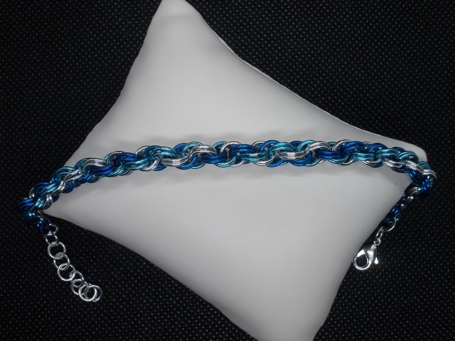 Three colour double spiral bracelet