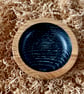 Small, hand-turned wooden dish with vibrant aqua grain detail. - Image 4
