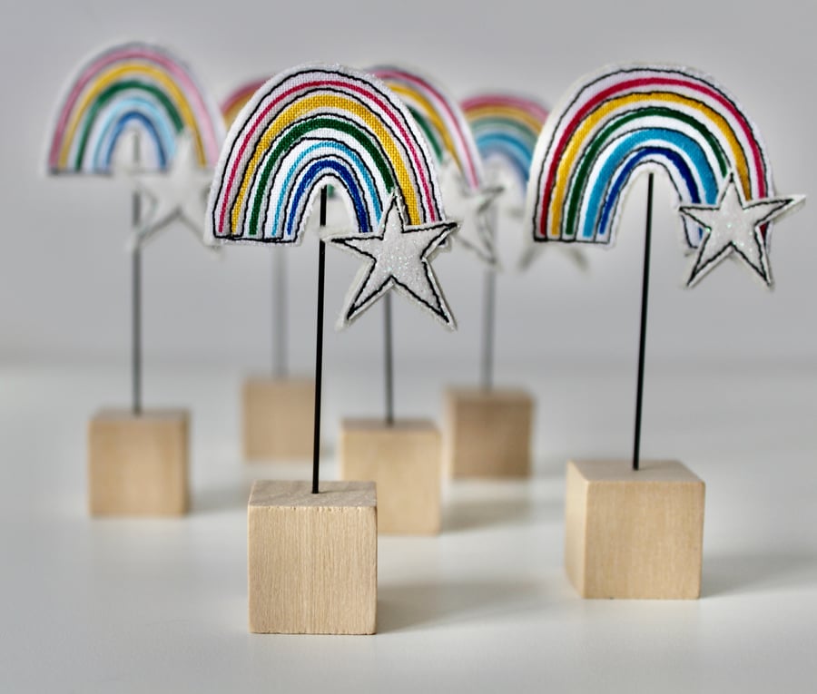 A Rainbow with a Wire Stem & Wooden Block Stand