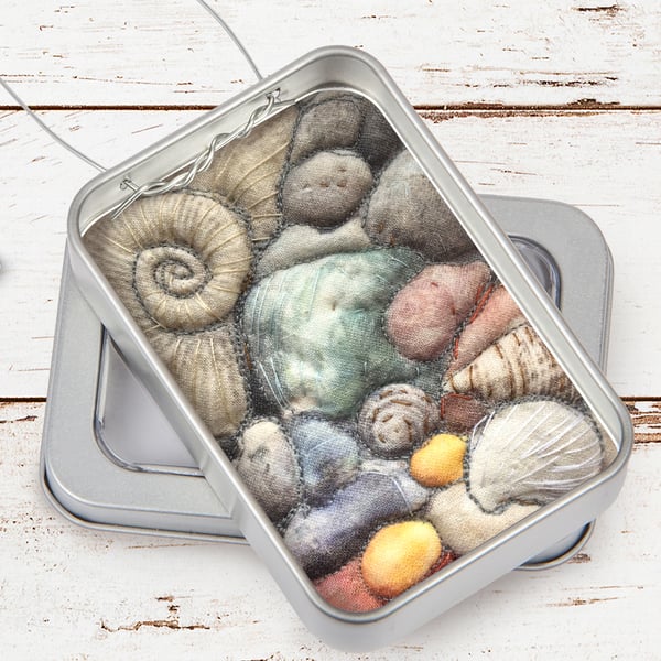 fabric pebbles, 3D shells and ammonite picture, framed in tin, beach gift