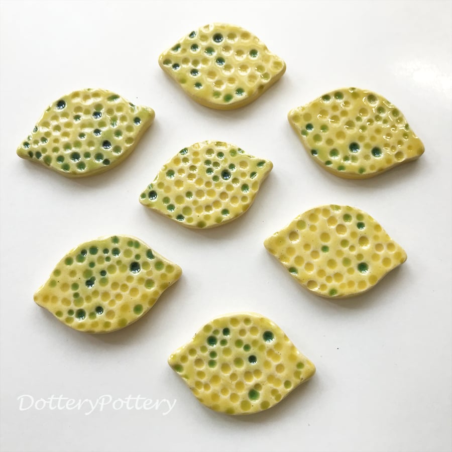 Set of seven small ceramic lemon tiles