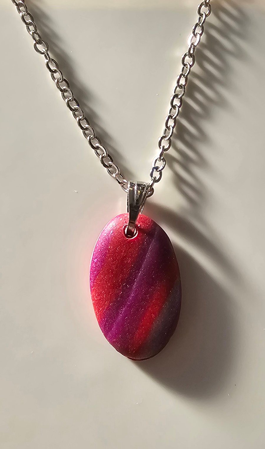 Oval pink pattern necklace
