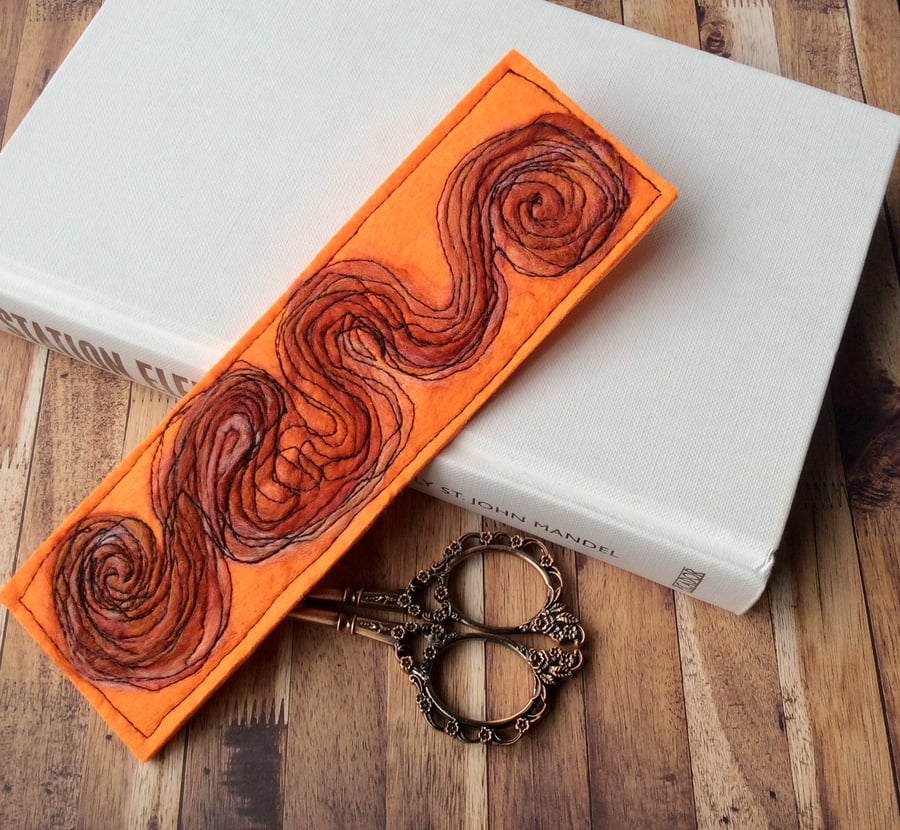 Dazzling swirly embroidered bookmark. 