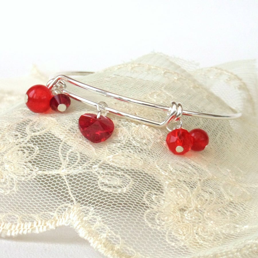 Red gemstone and crystal bangle bracelet, with crystal heart by Swarovski®