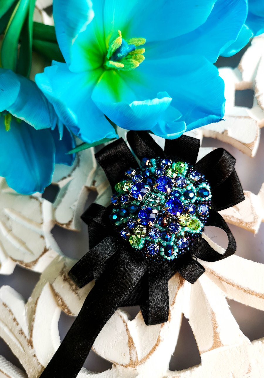 Marina Swarovski crystal blue and lime green black beaded ribbon brooch
