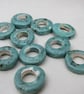 10 Medium Eggshell Blue Glazed Ceramic Donut Beads - Image 1
