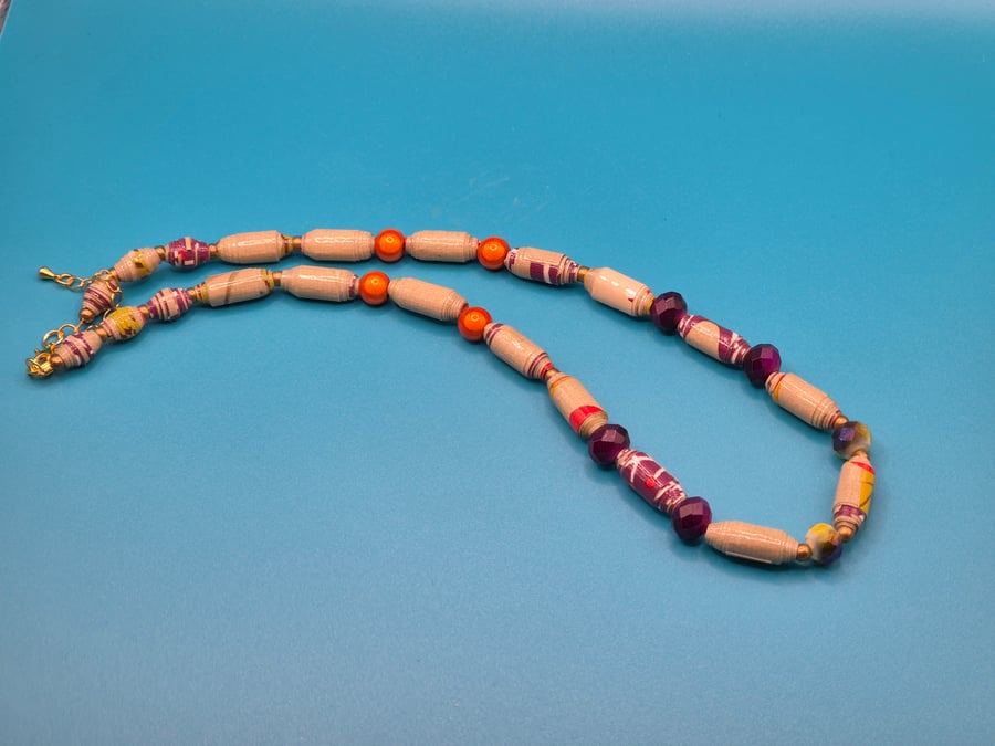 Necklace made with multi coloured wall paper beads and preloved colourful beads