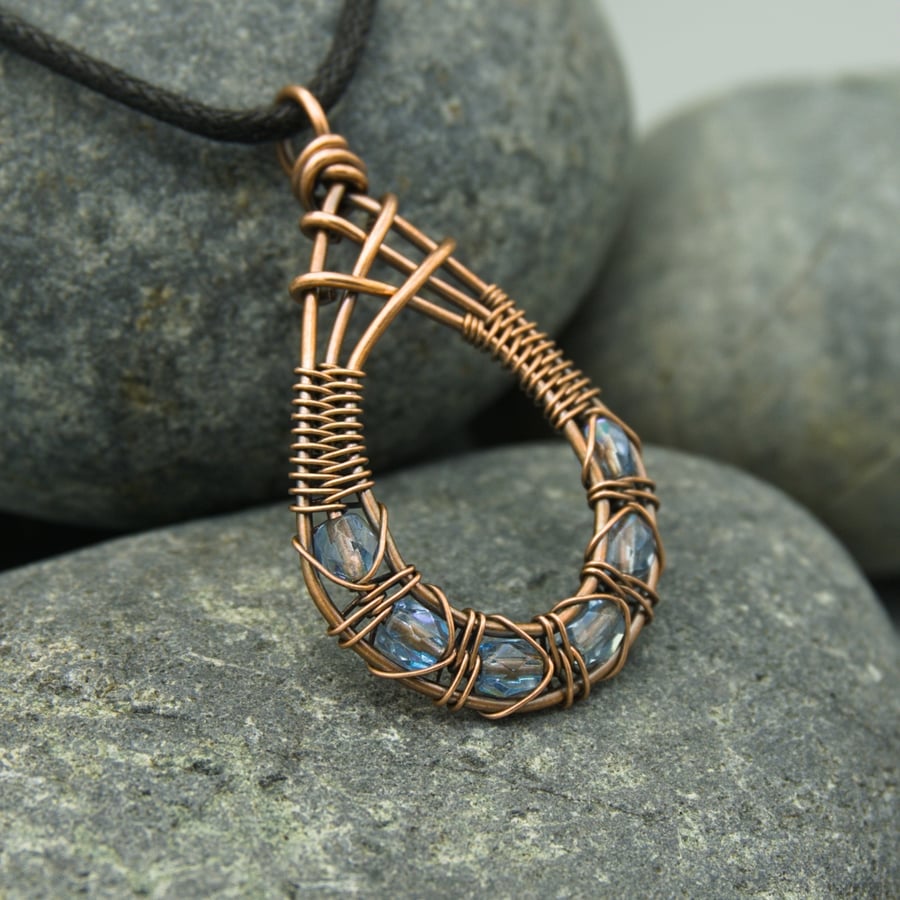 Copper Wire Weave Fishtailed Drop Pendant with Pale Blue Faceted Glass Beads