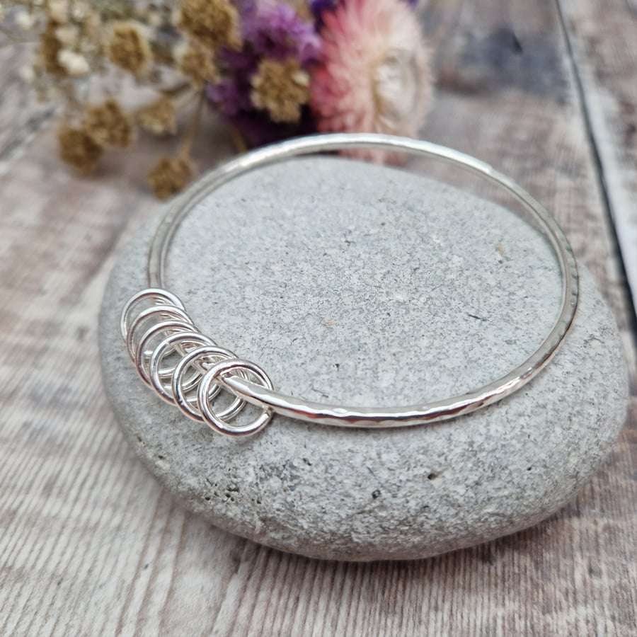 Sterling Silver Hammered Round Bangle with Six Rings - 60th Birthday, 6 Decades