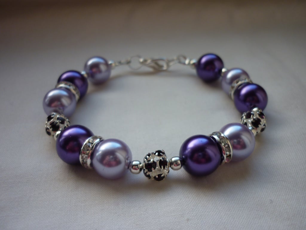 PURPLE, LAVENDER AND SILVER RHINESTONE BRACELET.  621
