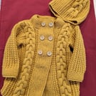 Child's cable jacket with matching hat