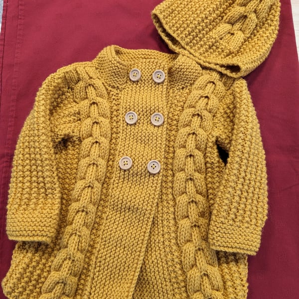 Child's cable jacket with matching hat