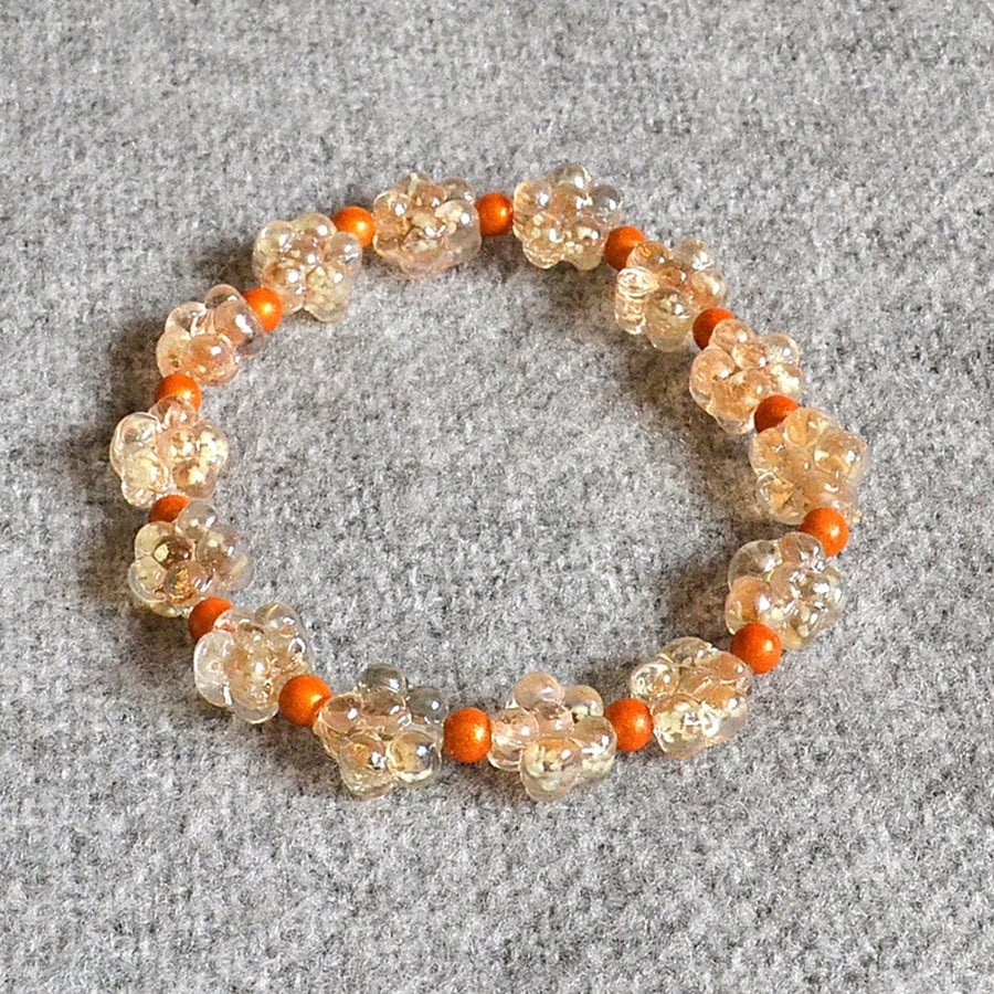 Honey-Tinged Glass Flower Bead Elastic Bracelet, with Orange Miracle Beads