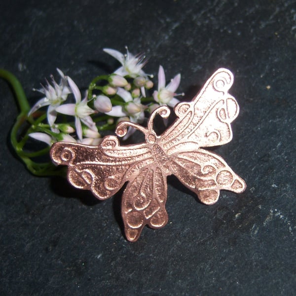 Butterfly brooch in etched copper