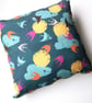 fly free cushion with bird print in bright colours