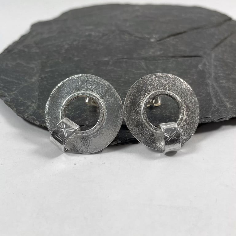 large circular sterling silver stud earrings