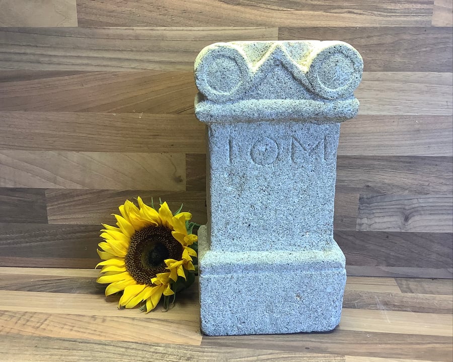 Replica of Roman Altar carved from stone featuring IOM