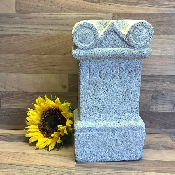 Replica of Roman Altar carved from stone featuring IOM