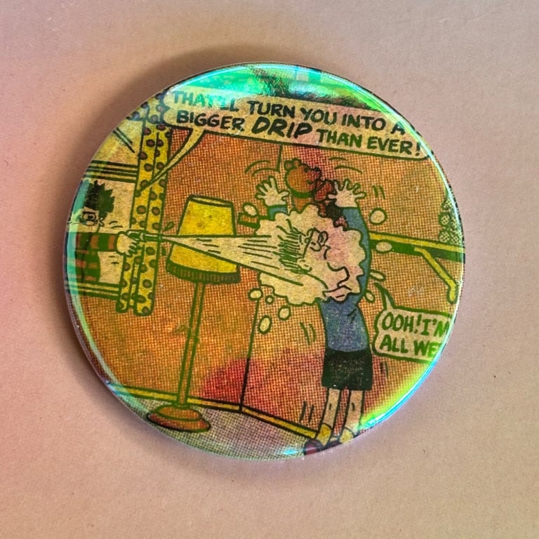 Holographic vintage book pin badge - Dennis the menace bigger drip