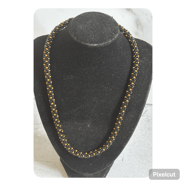 Black and bronze polka dot kumihimo beaded necklace