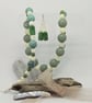 Mother of Pearl and sage green bead necklace and earring set retro vintage