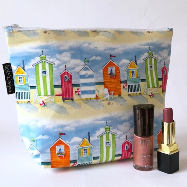 Makeup bags , beach huts