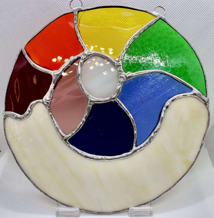 Rainbow shell stained glass round snail suncatcher