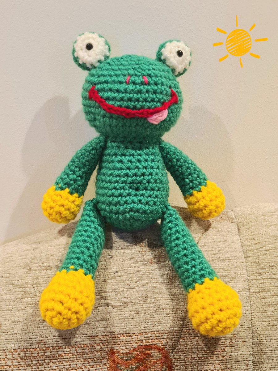 Handmade crochet frog toy