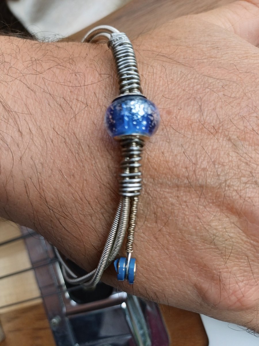 Up-Cycled Re-purposed Guitar String Bangle. Fabulous for any musician