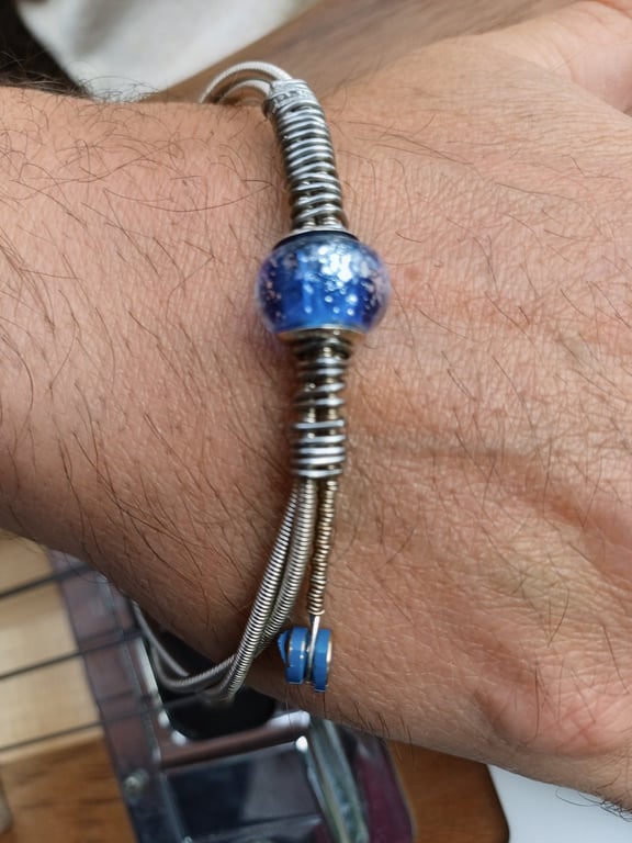 Up-Cycled Re-purposed Guitar String Bangle. Fabulous for any musician