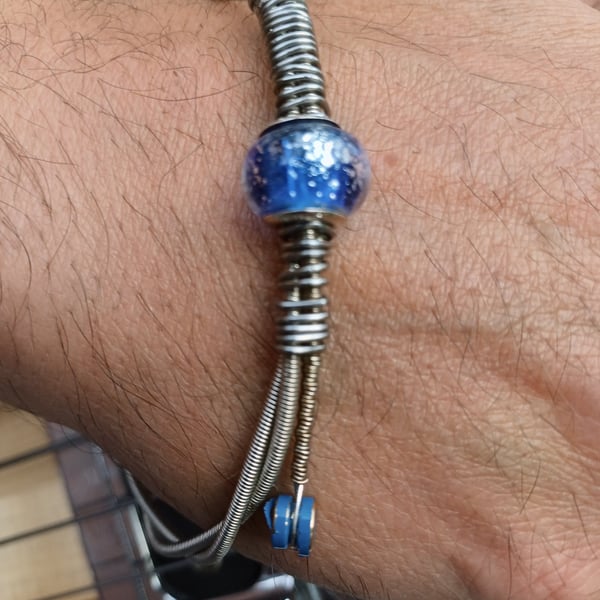 Up-Cycled Re-purposed Guitar String Bangle. Fabulous for any musician