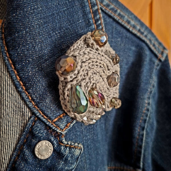 Crocheted and beaded brooch