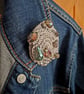 Crocheted and beaded brooch