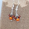 ER26 Orange and brown miracle bead drops