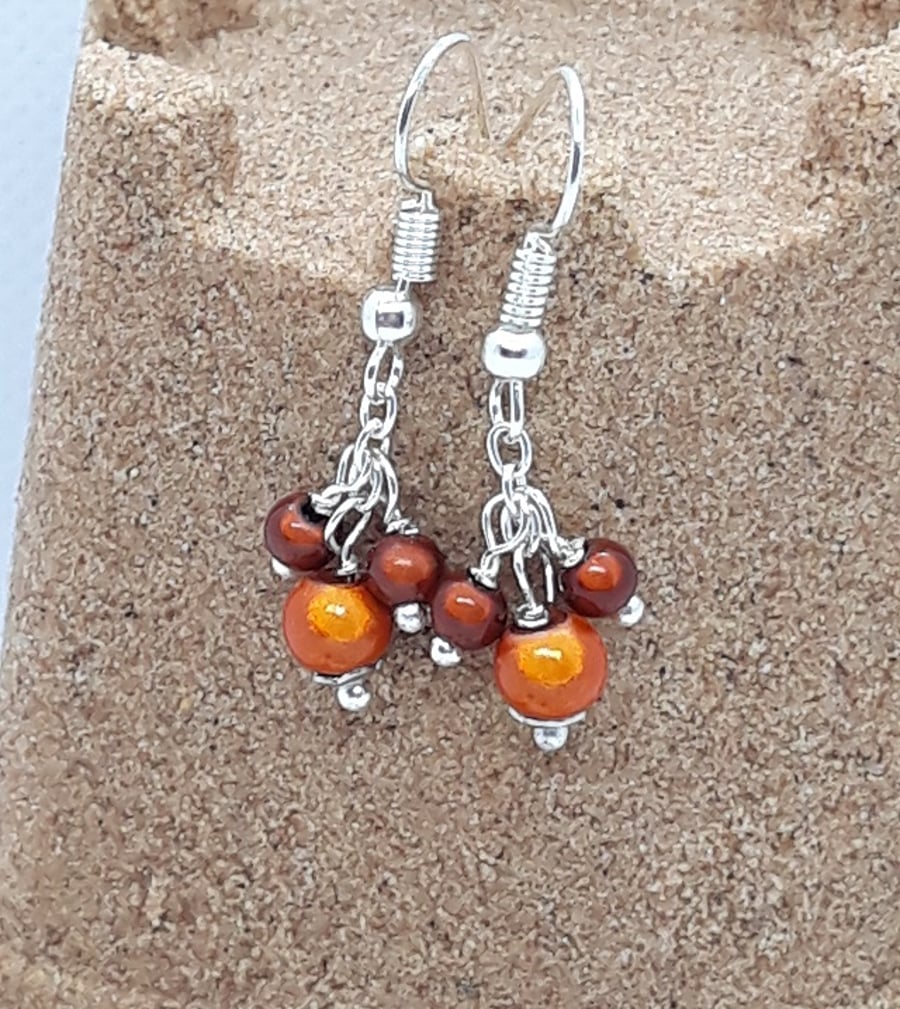 ER26 Orange and brown miracle bead drops